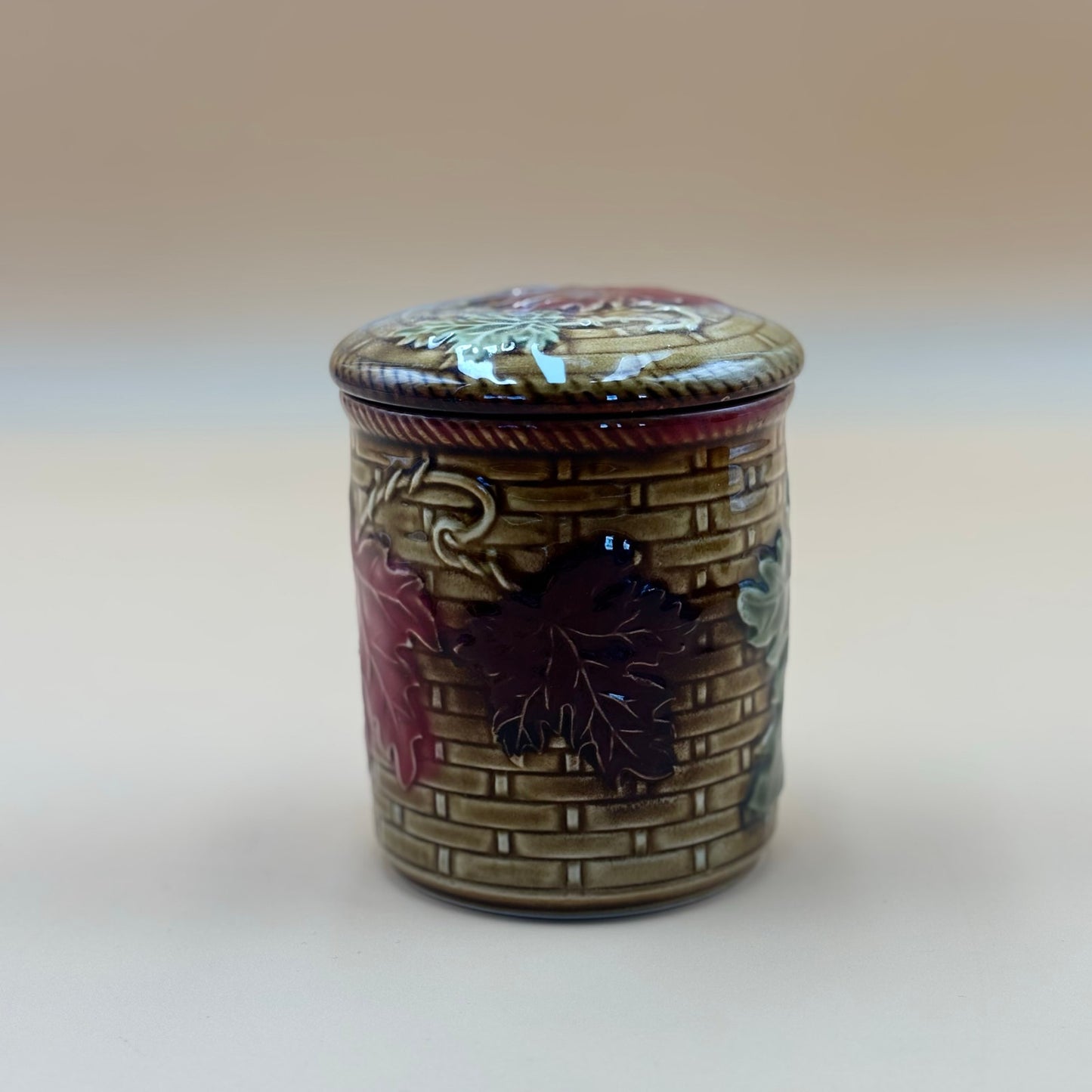 Vintage Embossed Ceramic Canister with Grapevine Design β Brown & Burgundy
