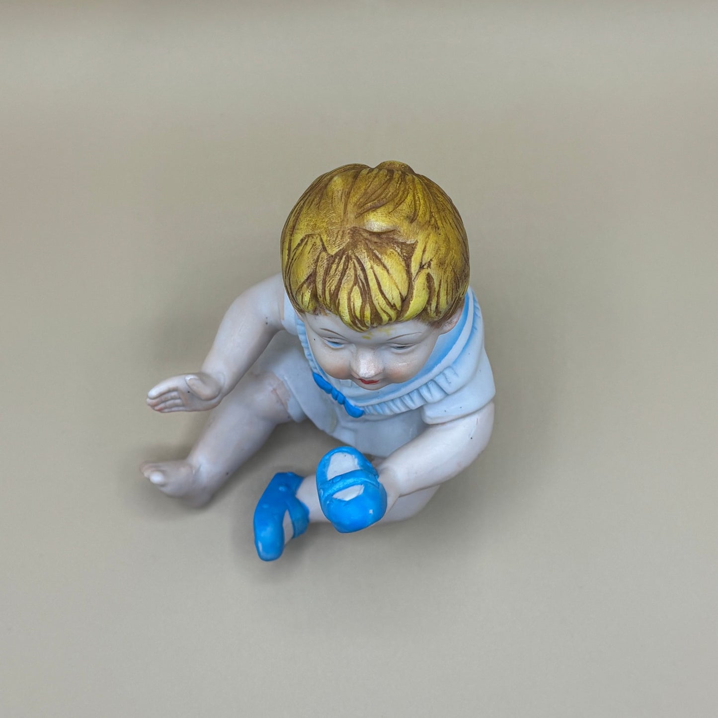 VTG Baby Boy Porcelain Figurine Putting His Shoes on 5.5"