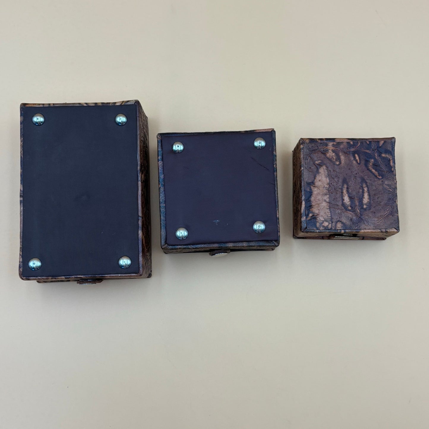 VintaEgyptian Leather Jewelry Boxes Set of 3 with Silver Embossed Designs & Red Felt Lining