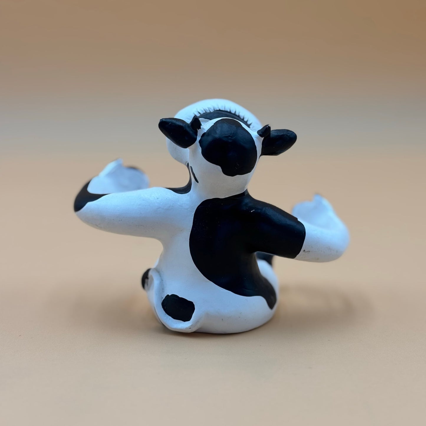 Stretch-Arm Cow Figurine – L Dake & Ln Vintage Stone Like