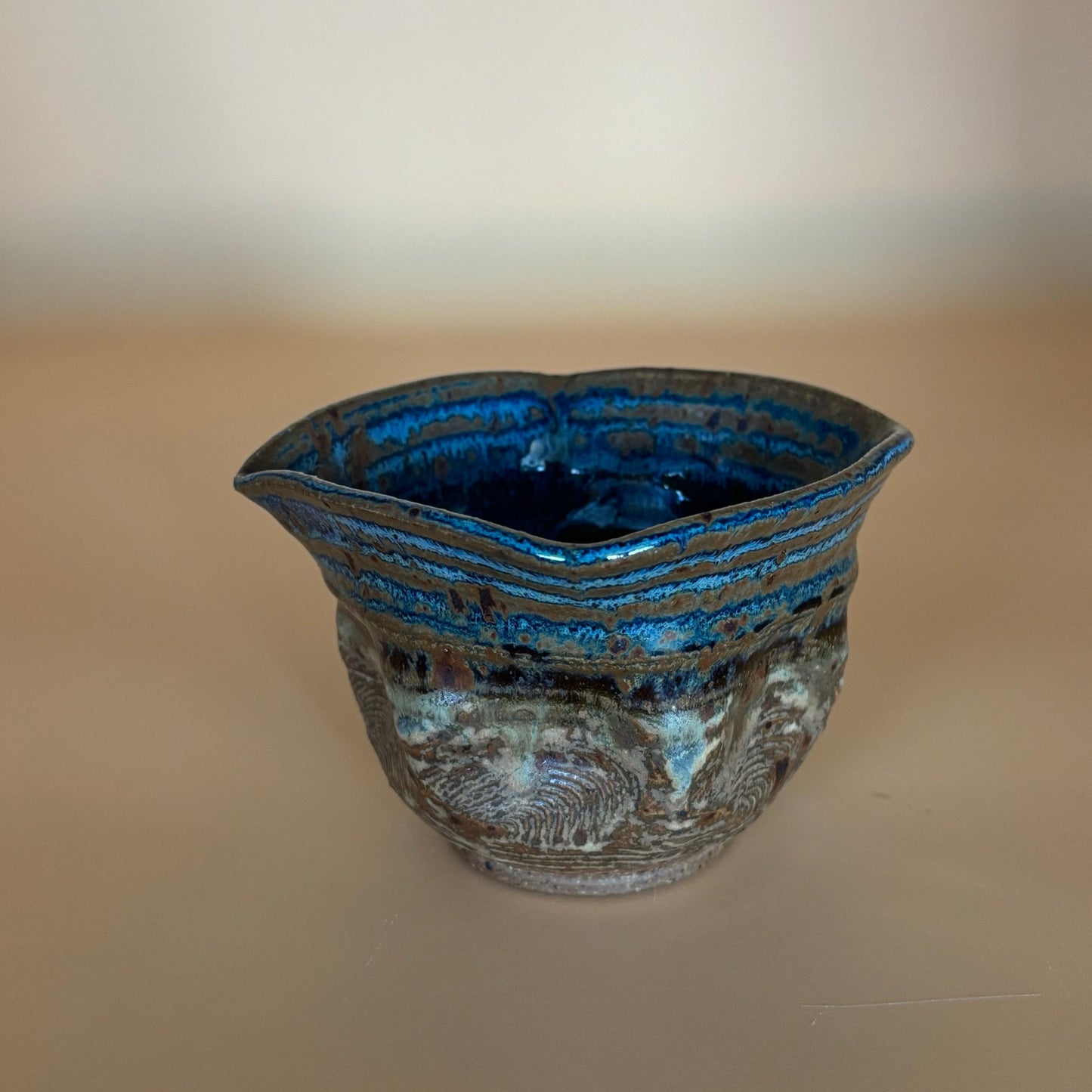 Signed Caruso Studio Pottery Bowl – Blue & Earth-Toned Glaze