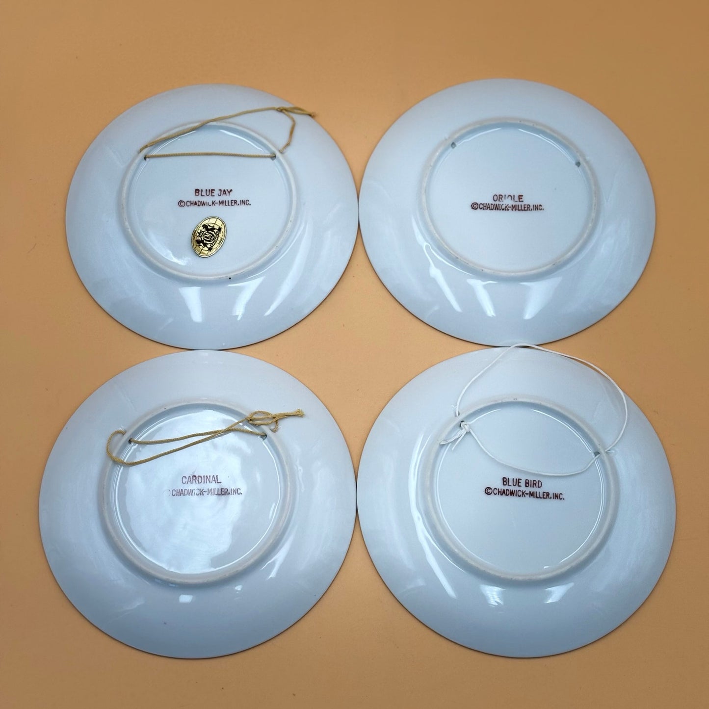 Chadwick Fine China Bird Plates – Set of 4 (Bluebird, Blue Jay, Cardinal, Oriole)