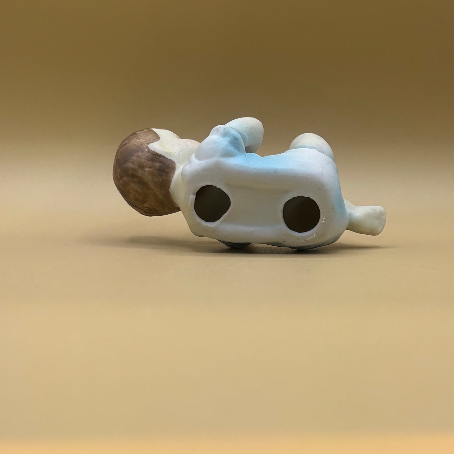 Pair of Porcelain Vintage Playing Baby Figurines