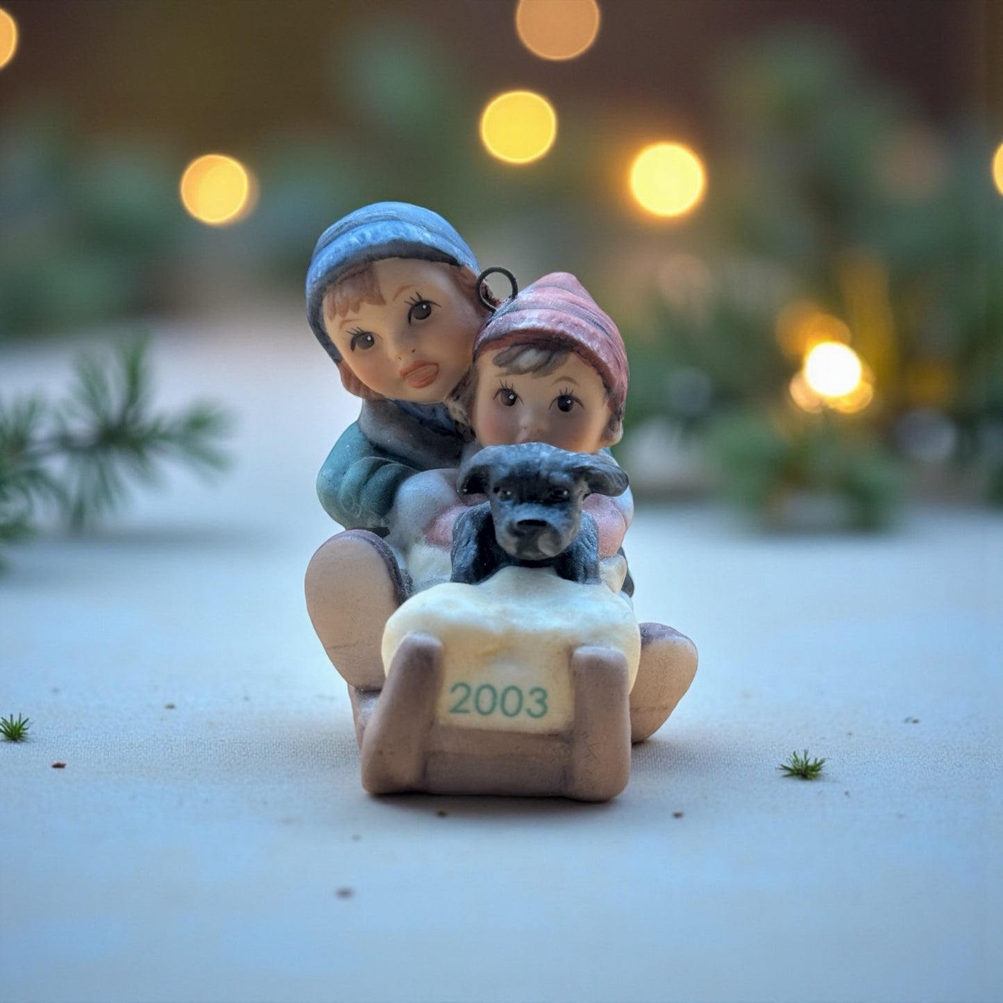 Goebel 2003 Boy and Girl on Sled Ornament with Puppy