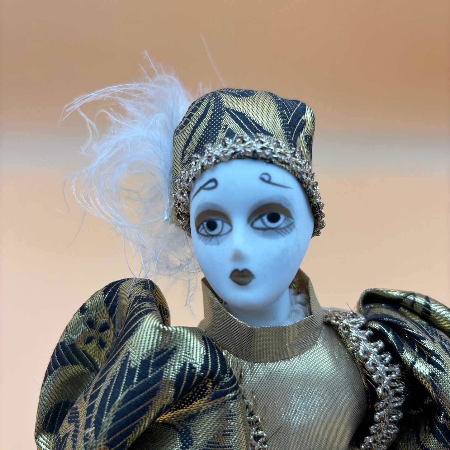 Gold & Black Porcelain Clown Musical Rotating Doll