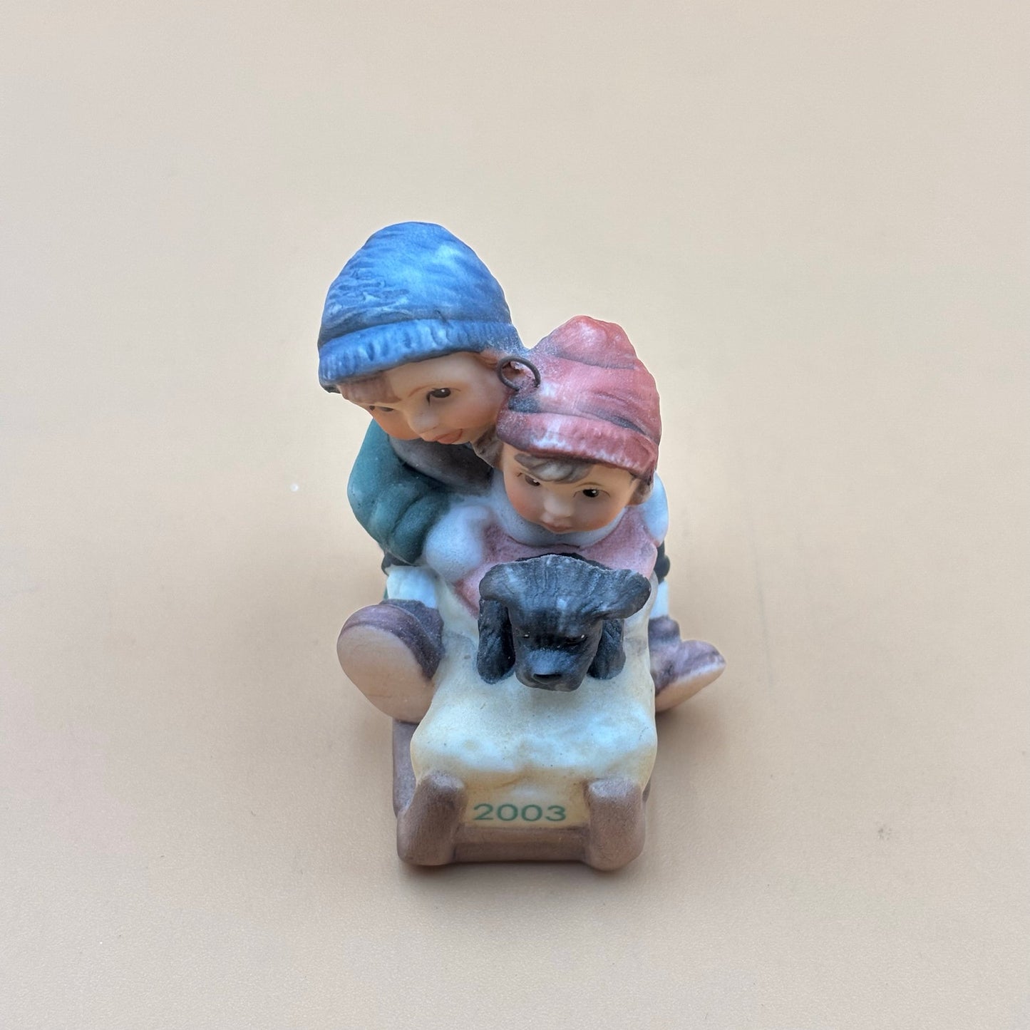 Goebel 2003 Boy and Girl on Sled Ornament with Puppy