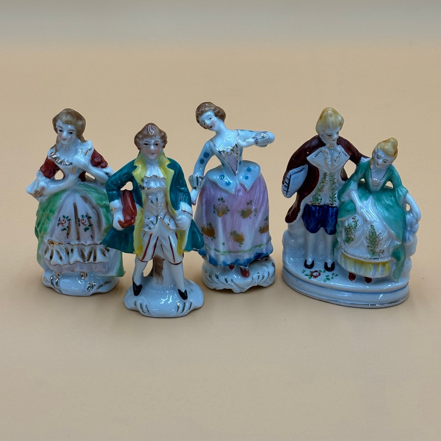 Vintage Hand-Painted Japanese Porcelain Figurines - Colonial Set (4 Pieces)
