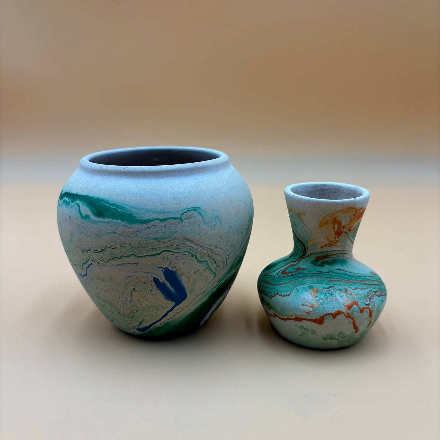 Pair of Vintage Nemadji Pottery Vases – Swirled Green, Blue & Orange Clay