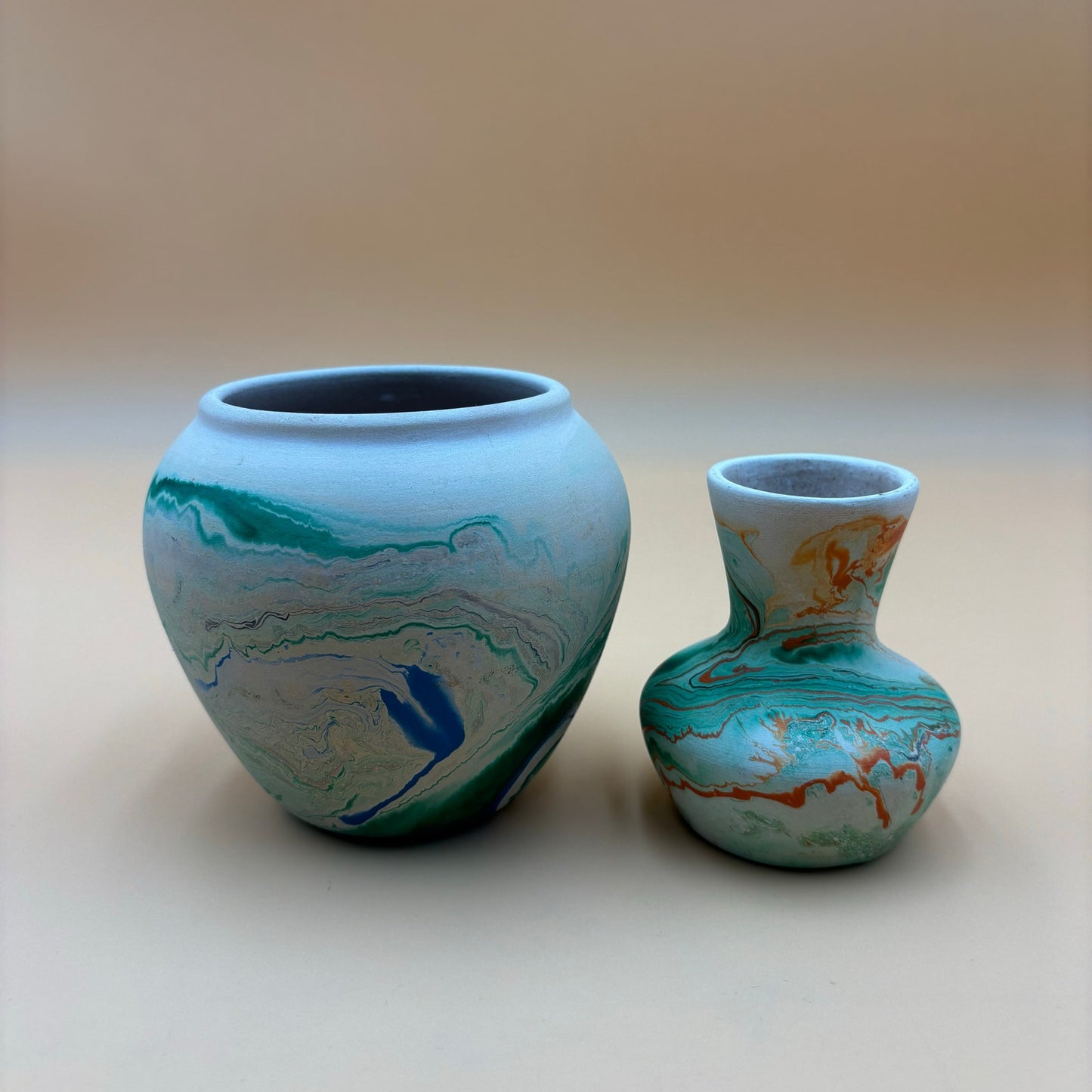 Pair of Vintage Nemadji Pottery Vases – Swirled Green, Blue & Orange Clay