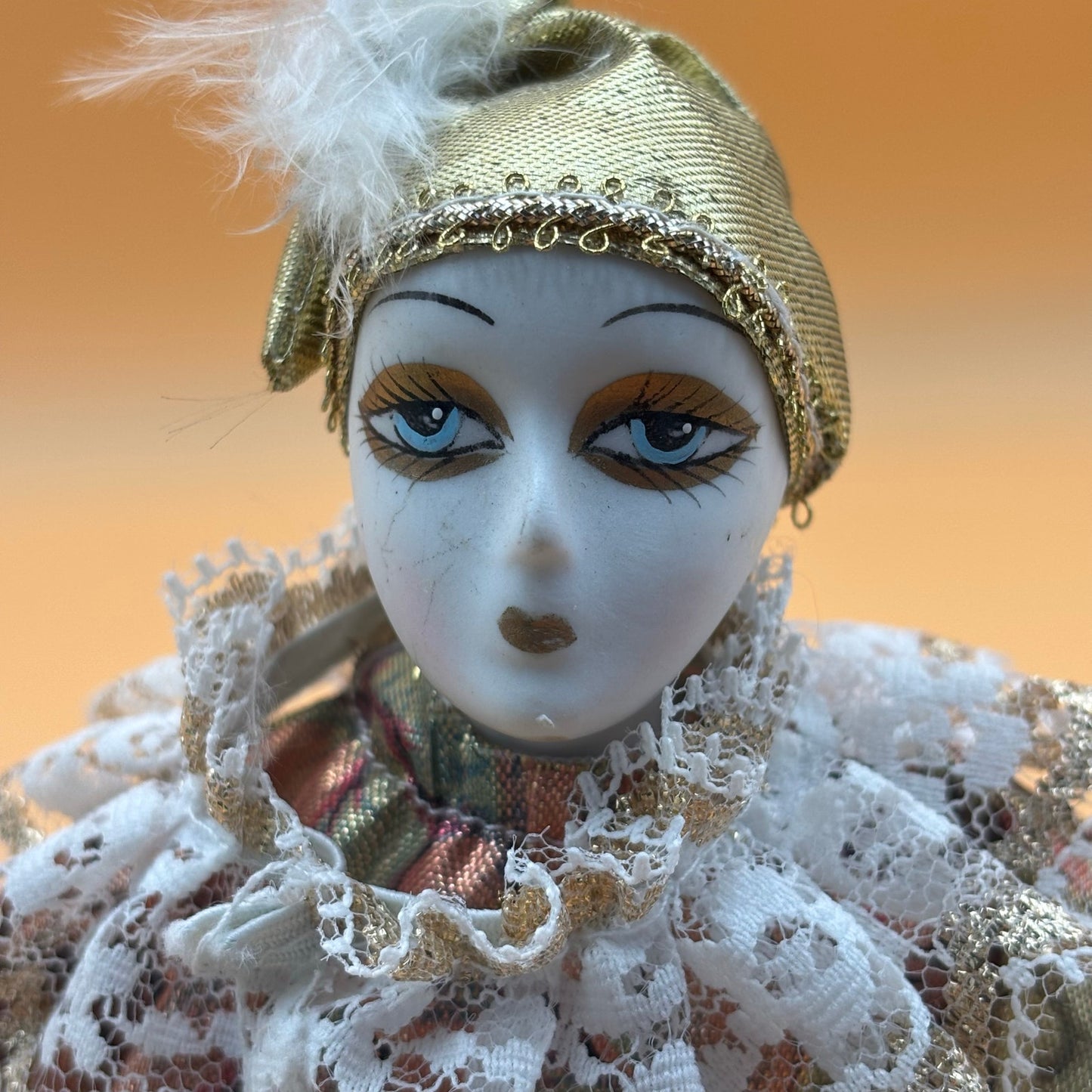 Porcelain Musical Clown Doll – Gold & Floral Dres