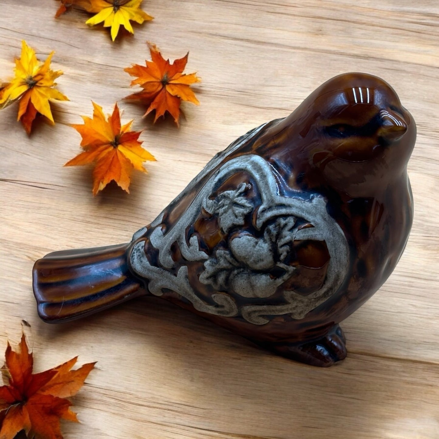 Brown Glazed Ceramic Bird Figurine with Raised Leaf and Vine Detail