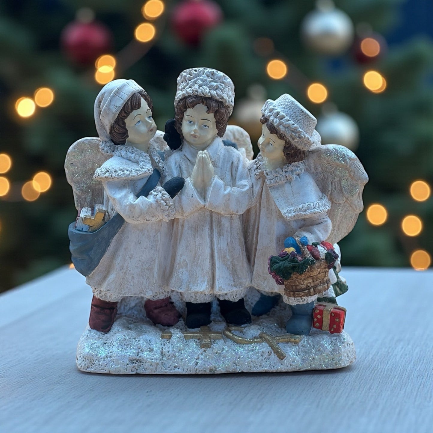 Three Angels Christmas Figurine with Gifts and Glitter Accents