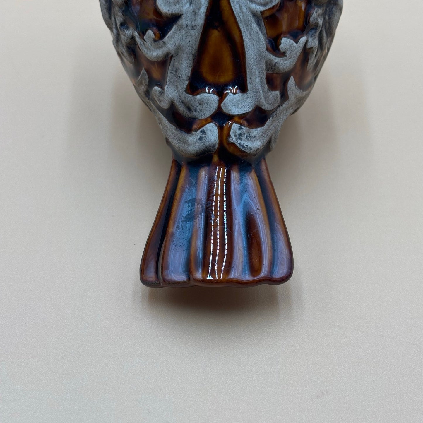 Brown Glazed Ceramic Bird Figurine with Raised Leaf and Vine Detail