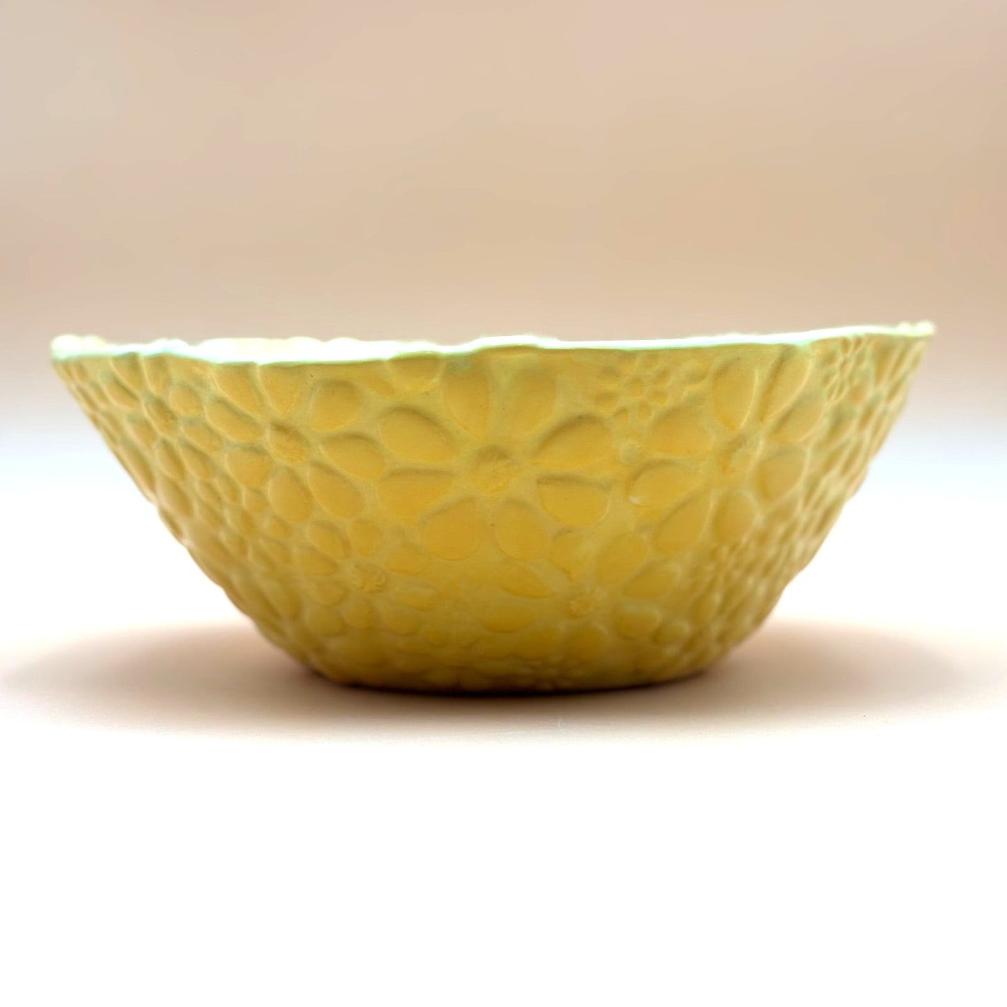 Handmade Bright Cheerful Yellow Pottery Bowl with Embossed Floral Design