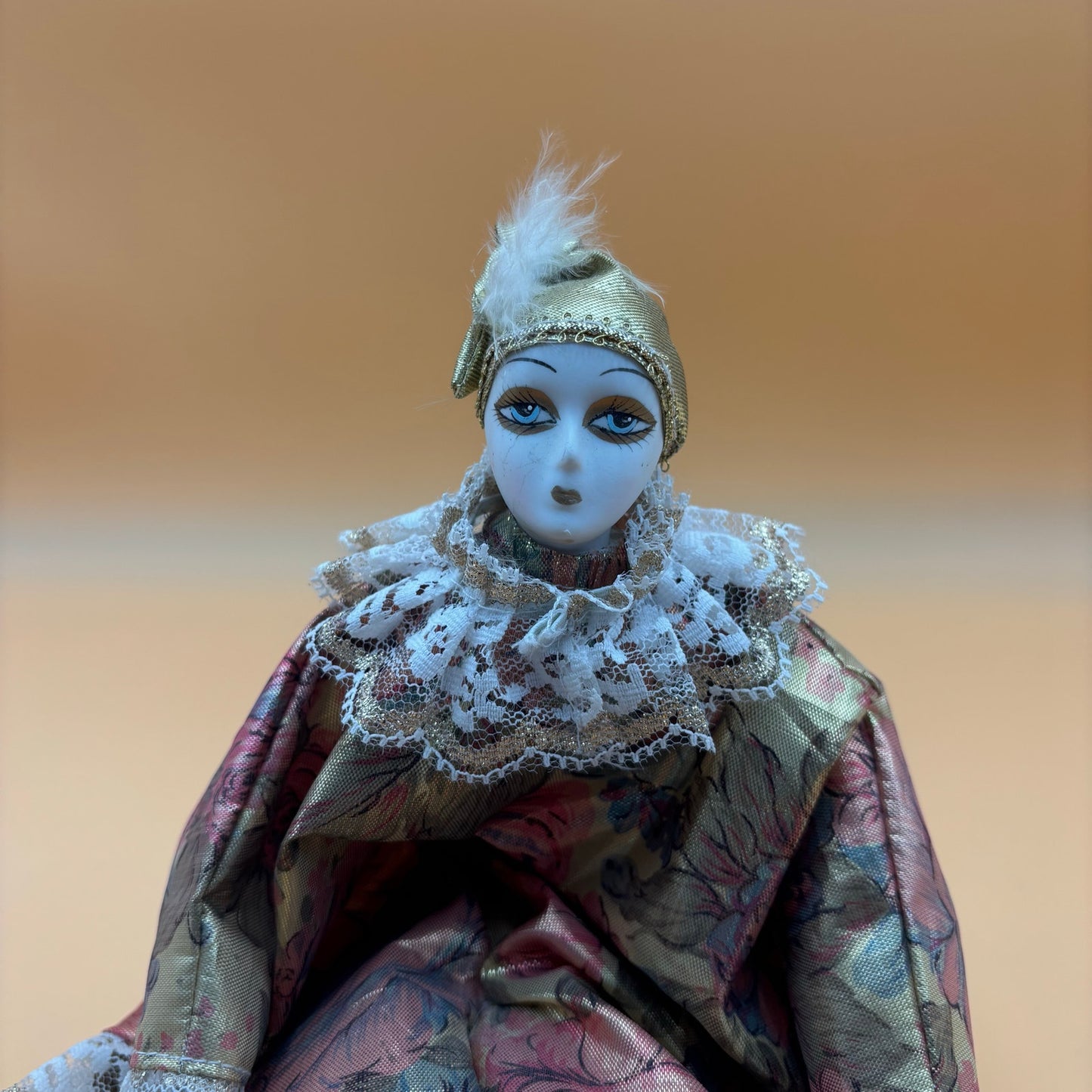 Porcelain Musical Clown Doll – Gold & Floral Dres