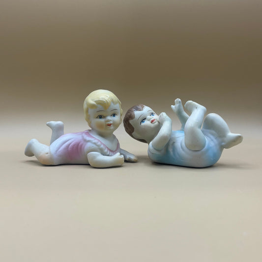 Pair of Porcelain Vintage Playing Baby Figurines
