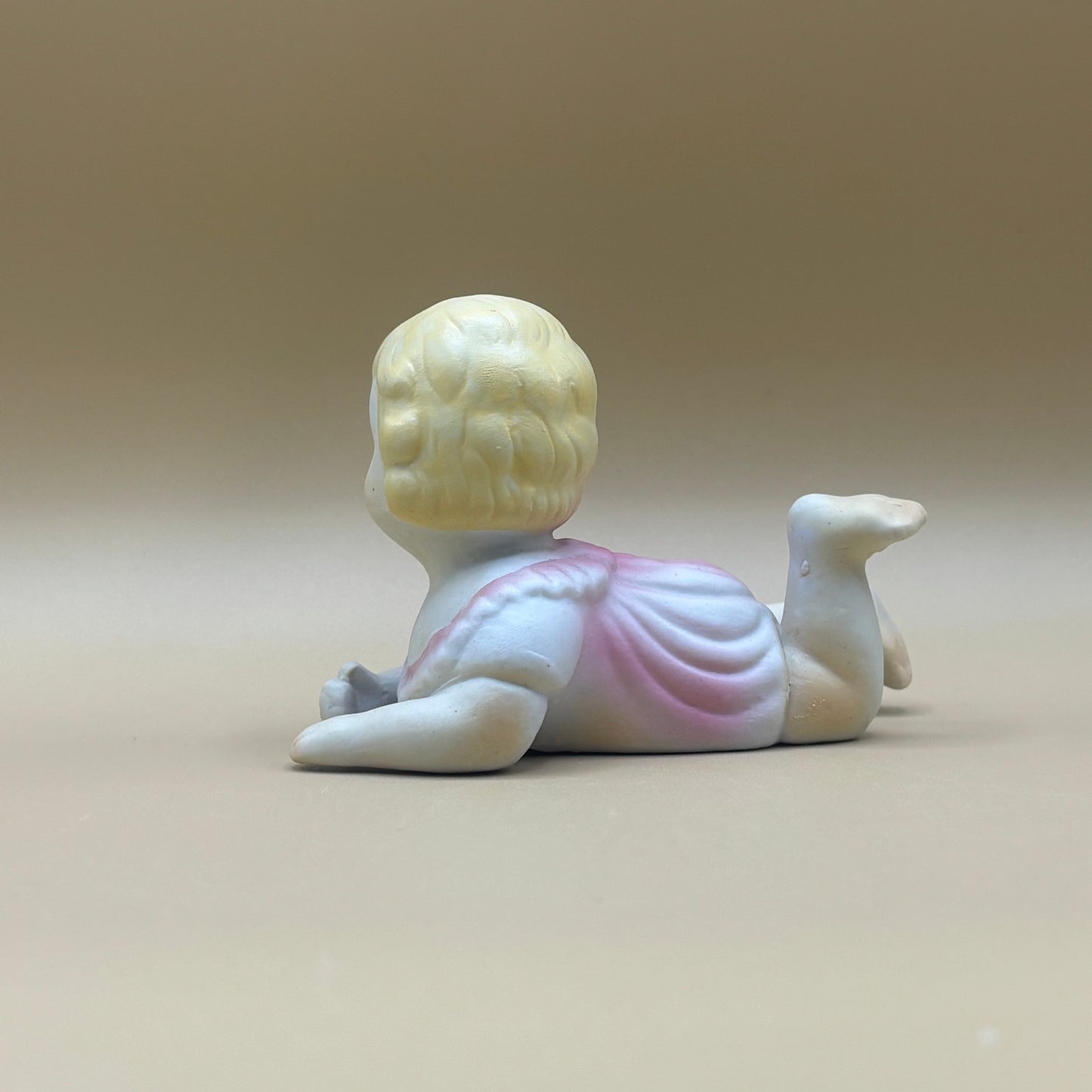 Pair of Porcelain Vintage Playing Baby Figurines