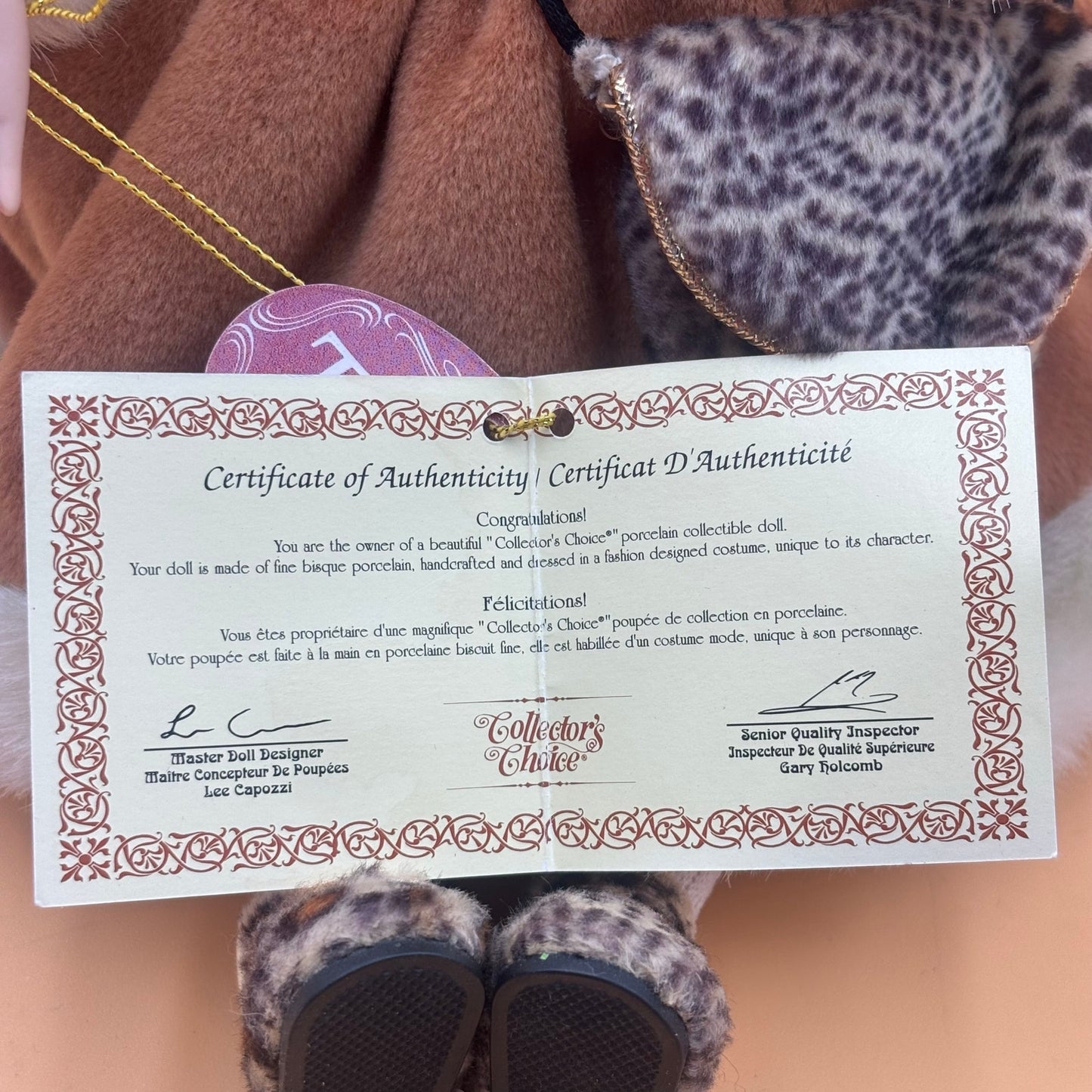 Collector’s Choice Animated Musical Porcelain Doll with Faux Fur & Leopard Trim Coat