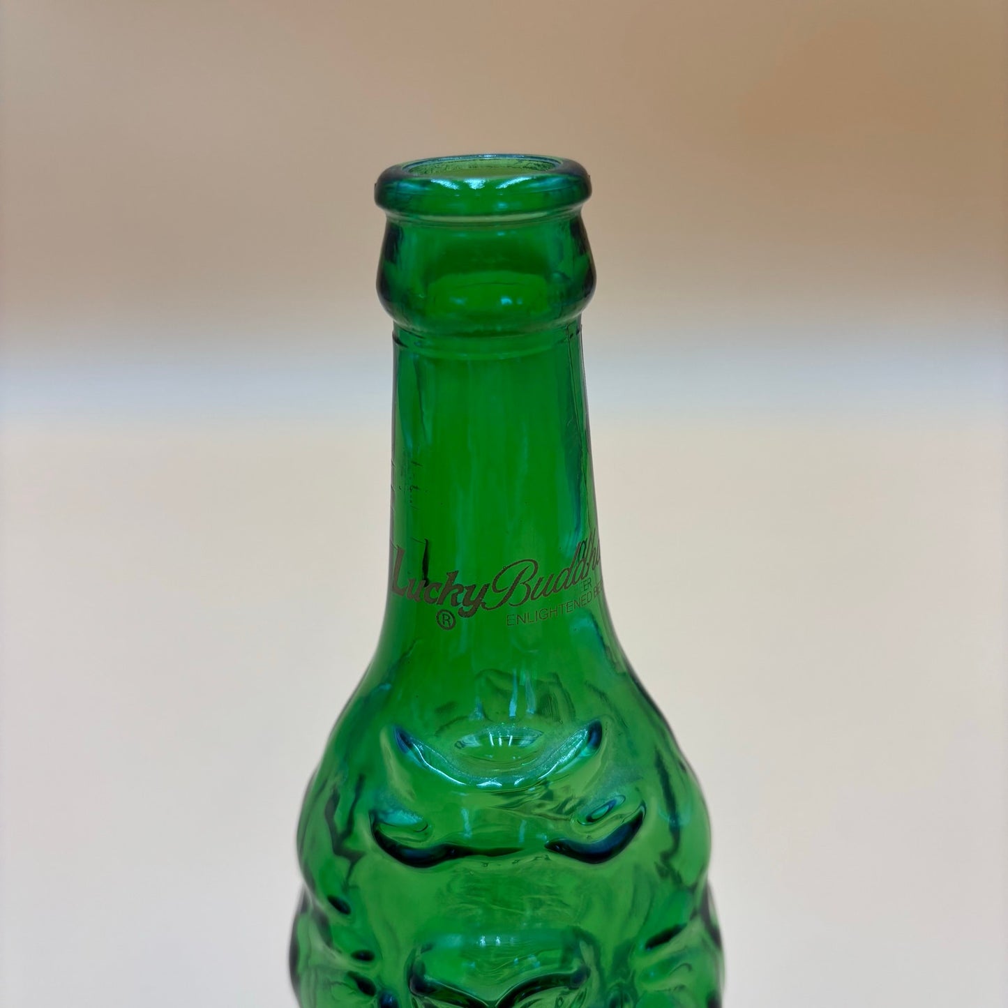 Vintage Lucky Buddha Beer Bottle – Embossed Green Glass Collectible