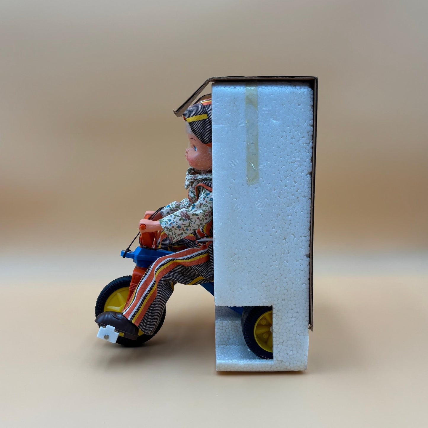 Vintage 1978 Playmates Pull Toy – Tricycle Doll with Striped Overalls