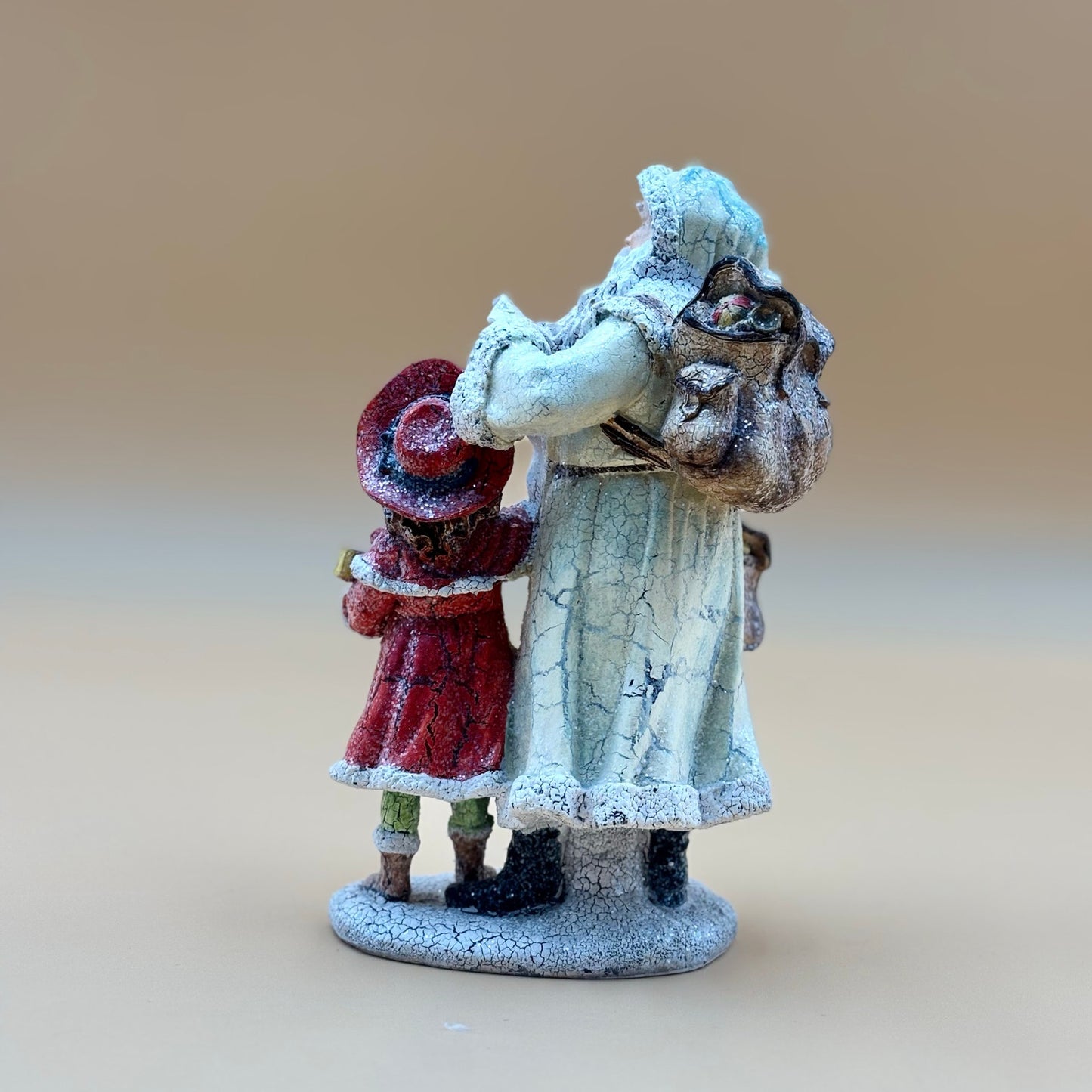 Vintage Crackle Santa and Girl Figurine with Glitter Finish