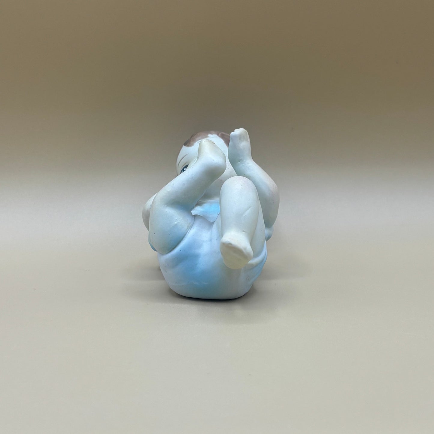 Pair of Porcelain Vintage Playing Baby Figurines