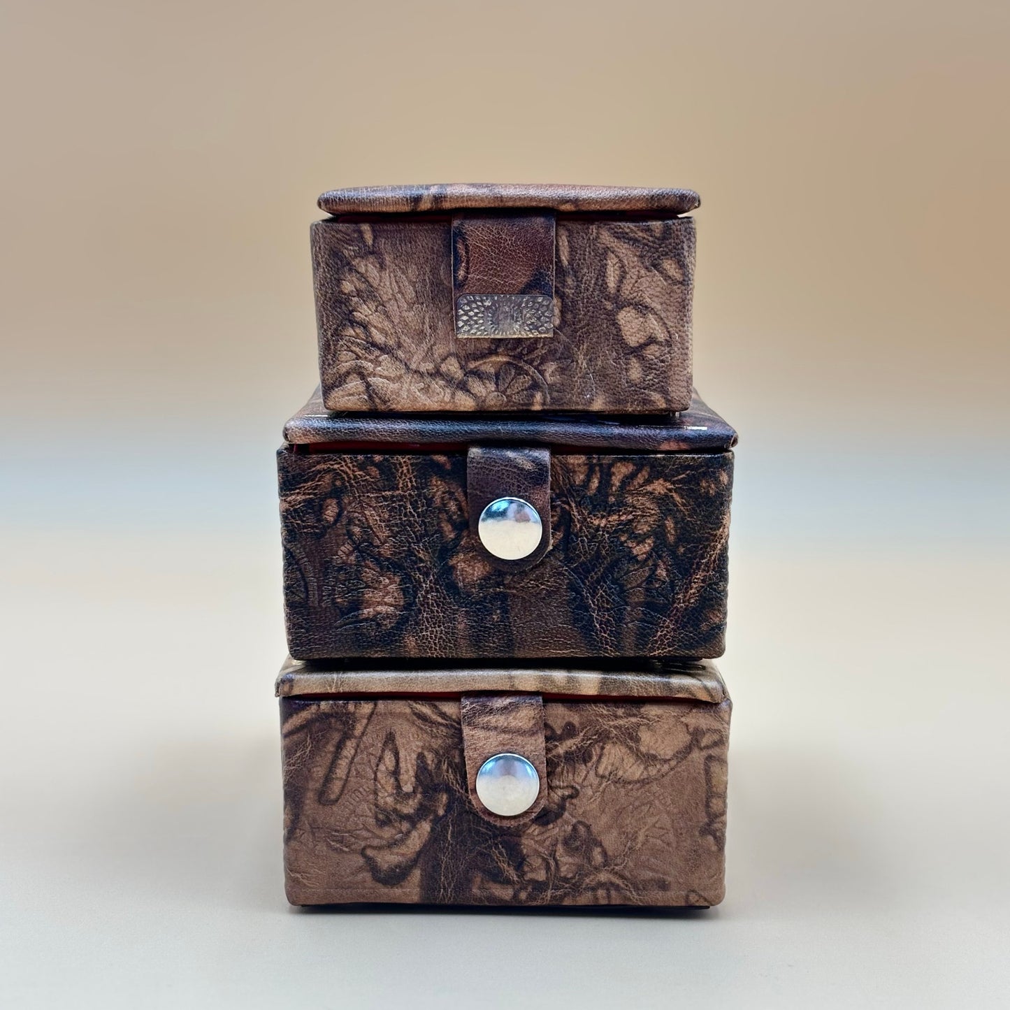 VintaEgyptian Leather Jewelry Boxes Set of 3 with Silver Embossed Designs & Red Felt Lining