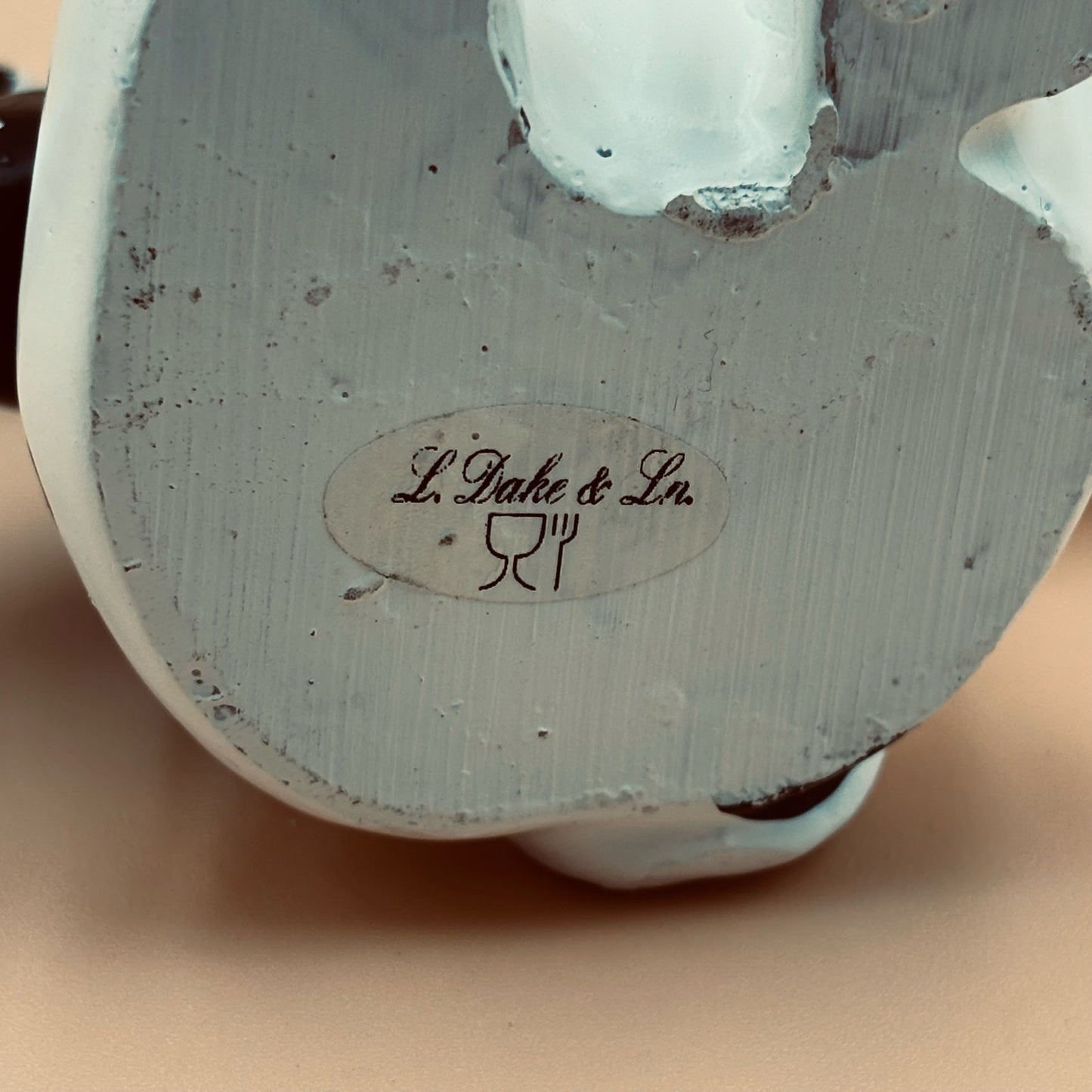 Stretch-Arm Cow Figurine – L Dake & Ln Vintage Stone Like