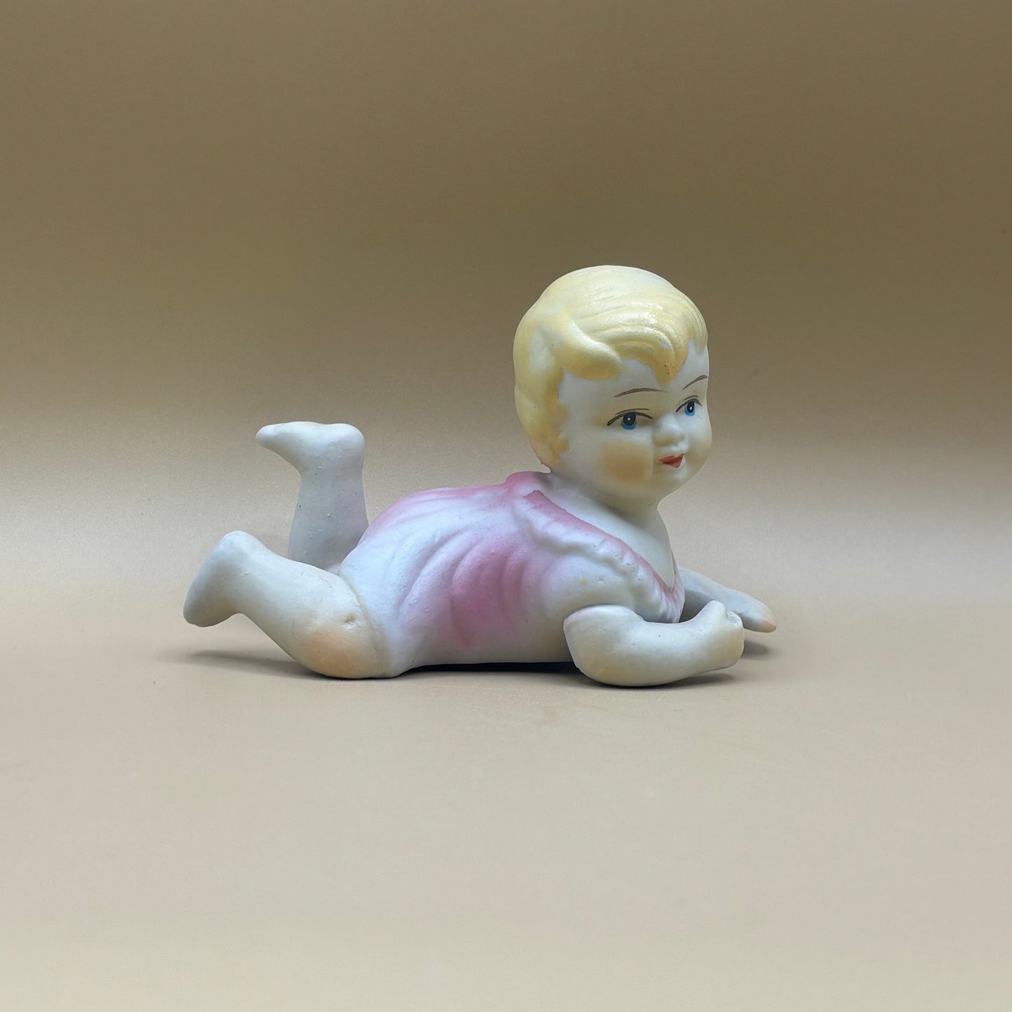 Pair of Porcelain Vintage Playing Baby Figurines