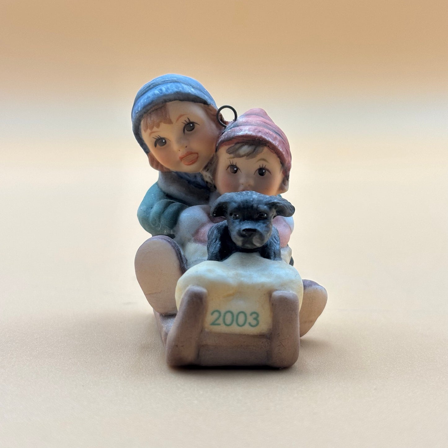 Goebel 2003 Boy and Girl on Sled Ornament with Puppy