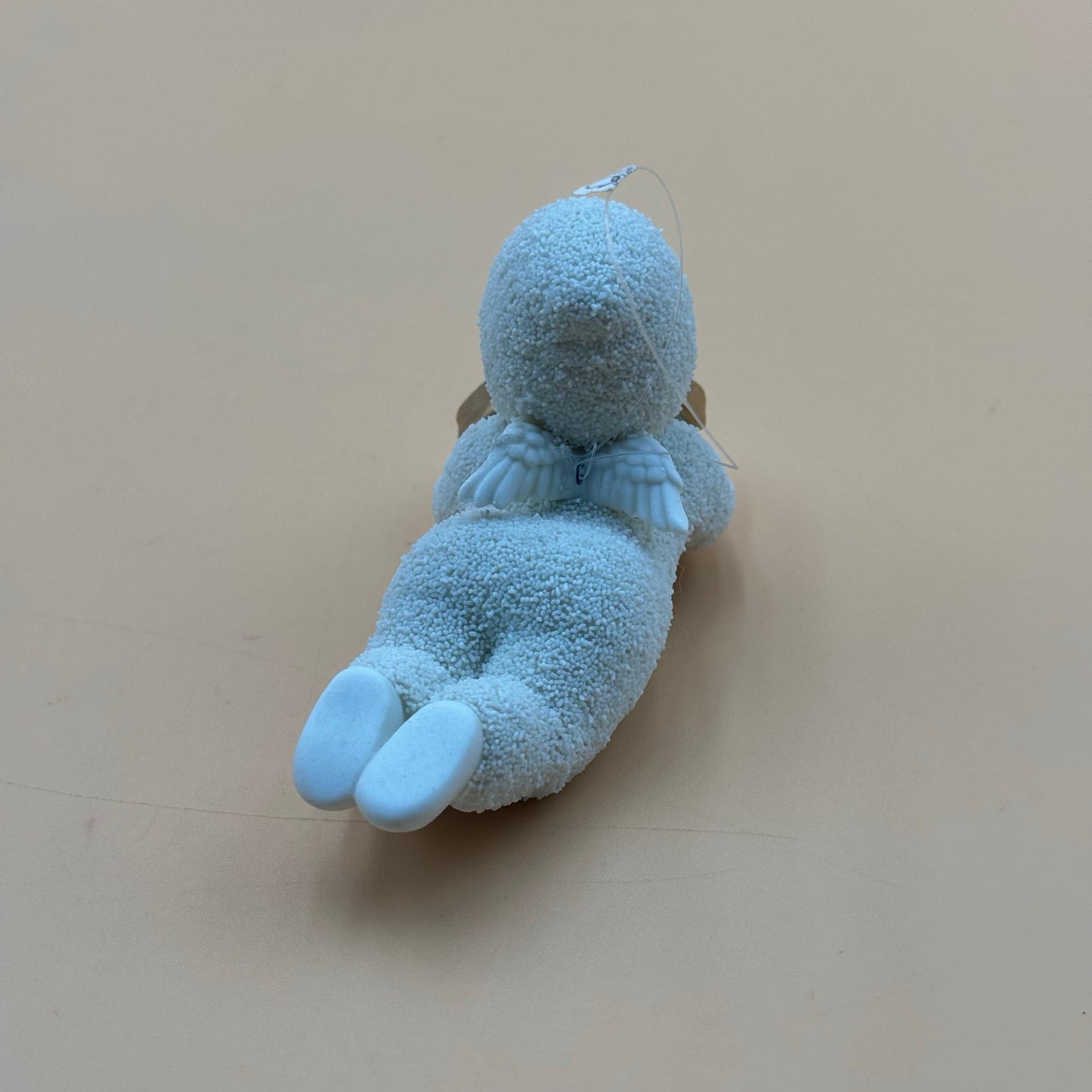 Department 56 Snowbabies “Gift Bearer” Ornament – Laying with Present