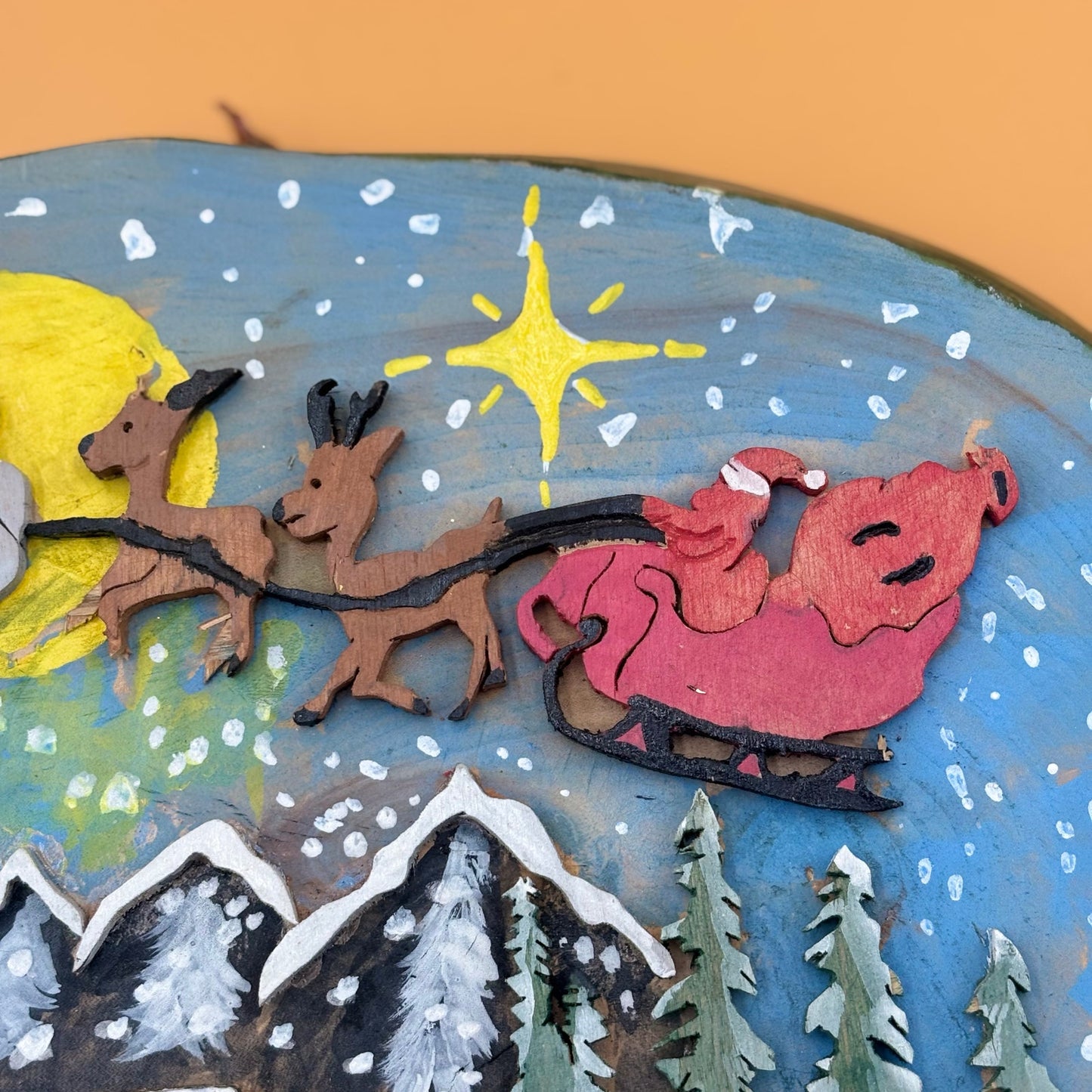 Handmade Painted Wood Slice Christmas Wall Hanging – Cabin & Sleigh Scene